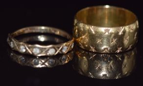 An 18ct gold wedding band / ring with star decoration (6g) and a 9ct gold ring set with paste, 1.2g