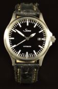 Sinn gentleman's automatic wristwatch ref. 556 with date aperture luminous hands and markers,