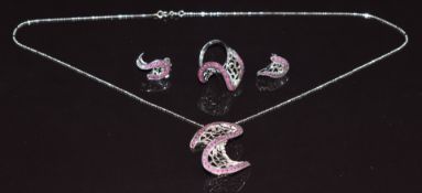 A suite of 18ct white gold jewellery comprising ring, necklace and earrings, all set with rubies,