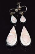 A pair of Victorian jet earrings set with coral cameos, 5cm long, 8g