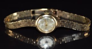 Marvin 9ct gold ladies wristwatch with gold hands and Arabic numerals, silver dial and signed 17