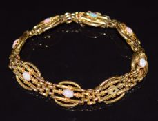 Edwardian 9ct gold bracelet set with oval cabochons, 18cm long, 15.5g