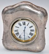 Keyless winding travelling clock in George V hallmarked silver stand, Birmingham 1911, maker Stewart