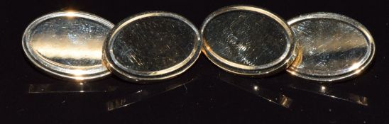 A pair of oval 9ct gold cufflinks, in original box, 17.6g