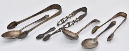 Hallmarked silver cutlery comprising three sets of sugar tongs, sifter spoon and two teaspoons,