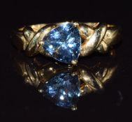 A 9ct gold ring set with blue topaz, 3.3g size N
