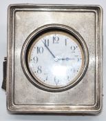 Nickel cased keyless winding Goliath pocket watch in Edward VII hallmarked silver stand,