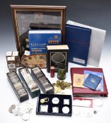 A quantity of coins comprising largely millennial, some replica coins, modern crowns etc, brass