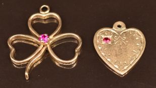 Two 9ct gold pendants, one in the form of a clover the other a heart engraved 'For my fair lady' ,