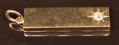 A 14K gold ingot pendant set with an old cut diamond of approximately 0.15ct, 16.1g