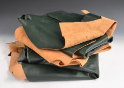 A quantity of tanned green and natural leather for upholstery and other uses, largest piece 2 x 1.