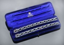 A pair of Bentley & Skinner Victorian bracelets set with old cut diamonds totalling approximately