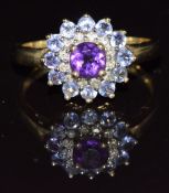 A 9ct gold ring set with an amethyst, diamonds and tanzanites, 3g, size Q