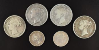 Six Victorian young head silver coins comprising four shillings, a groat and a threepence (all