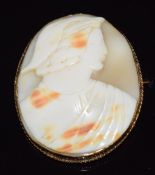 A 9ct gold brooch set with a cameo depicting a young man, 4.2 x 5cm