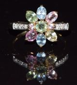 A 9ct gold ring set with topaz and diamonds, 3.1g, size M