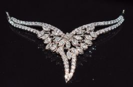 An 18ct gold white gold pendant set with princess, marquise and round cut diamonds, 6g, 5.2 x 3cm