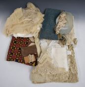 A quantity of linen and lace, tapestry table cloth or similar, 1895 comb, Civil Defence leaflets
