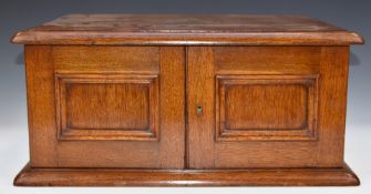 Mappin & Webb oak cutlery canteen with twin doors opening to reveal three graduated drawers, overall