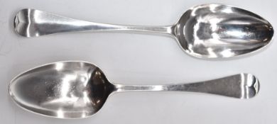 Two Georgian Ebenezer Coker bottom hallmarked silver table spoons, London 1751 and 1754, length 20.