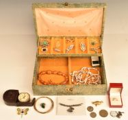A collection of costume jewellery including silver ring, silver locket set with enamel, shell