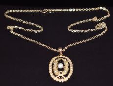 Edwardian 9ct gold pendant set with seed pearls and a pearl (3.3 x 2.7cm), on 9ct gold chain, 9.