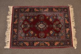 Turkish silk rug with red ground and floral decoration, with certificate, 160 x 109cm