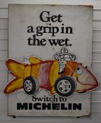 Michelin 'Get a Grip in the Wet' garage tyre advertising sign, with Bibendum riding a fish with