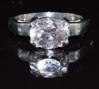 A 9k white gold ring set with an oval cut kunzite and diamonds, 4.2g, size Q