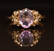 A 9ct gold ring set with a an oval cut amethyst, 2.5g, size O