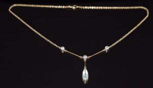 A 9ct gold necklace set with aquamarines, 5.2g, 40cm long