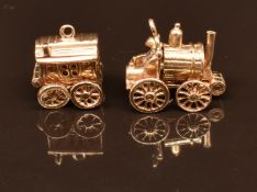 Two 9ct gold charms comprising caravan and a steam or traction engine, 8.3g