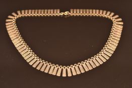 A 9ct gold Cleopatra style necklace made up of textured links, 18.4g, 38cm long