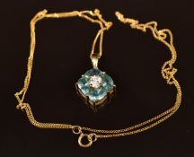 A 9k gold pendant set with white zircon and apatite, on 9ct gold chain, 2.6g