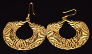 A pair of 18ct gold Egyptian earrings with embossed decoration, 14.7g