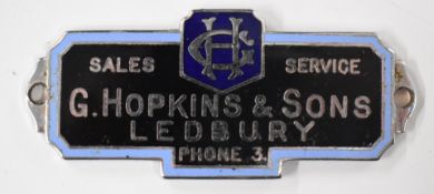 G.Hopkins & Sons, Ledbury sales and service enamel vintage car dashboard or similar badge, length