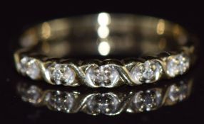 A 9ct gold half eternity ring set with diamonds, 1.8g, size P