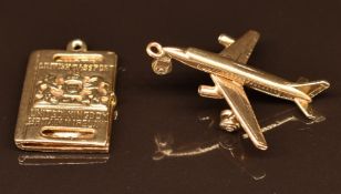 A 9ct gold passport charm and a 14k gold plane charm, 8.4g