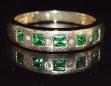 A 9k gold ring set with tsarvorite and diamonds, 3.6g, size M