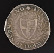 The Commonwealth 1653 shilling, obv. shield with English Arms, rev shield with English and Irish