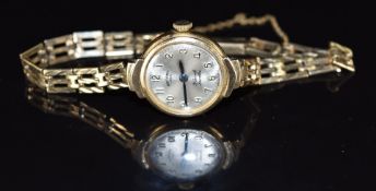 Rotary 9ct gold ladies wristwatch with blued hands, Arabic numerals, silver dial and 21 jewel