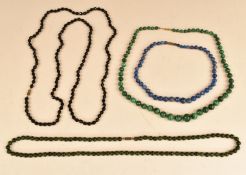 Four beaded necklaces comprising malachite with 9ct gold clasp, sodalite, nephrite jade and French
