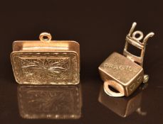 Two 9ct gold charms, one in the form of a jewellery box opening to reveal faux gemstones and the