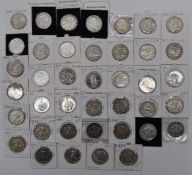 A collection of USA half Dollars, various years 1936-1986, in two album pages