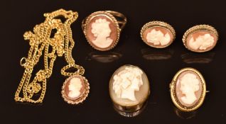 A 9ct gold ring set with a cameo, a matching pair of earrings and pendant on 9ct gold chain and