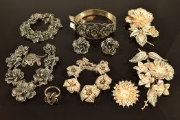 A suite of silver filigree jewellery comprising bangle, bracelet, earrings, ring and necklace