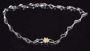 A palladium bracelet set with citrines, 16cm long, 4.4g