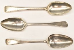 Three Georgian hallmarked silver Old English pattern table spoons, comprising a pair, London 1794,