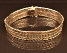 A 9ct gold tri-coloured bracelet, 24.1g