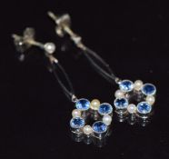 A pair of 9ct white gold earrings set with Montana sapphires and seed pearls, in original Johnson
